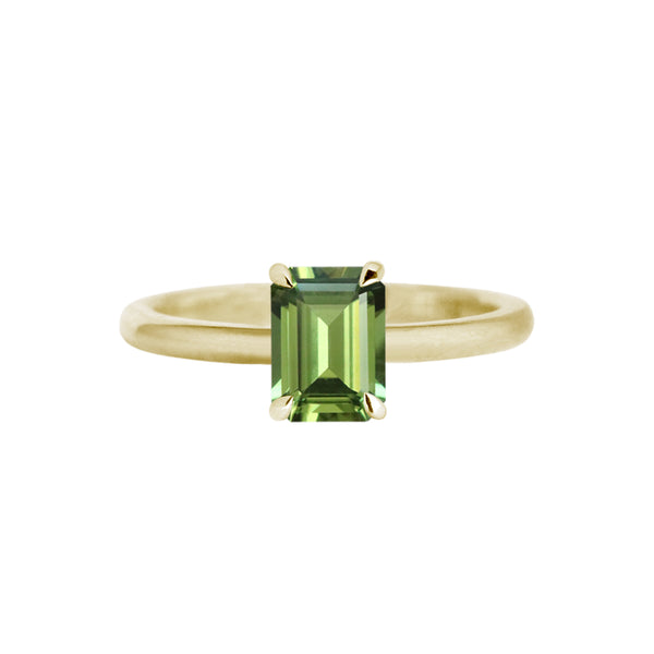 Handmade in 18ct yellow gold, this stunning solitaire engagement ring showcases a 1.60ct Emerald Cut Australian Green Sapphire.