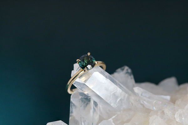 dark green parti sapphire engagement ring