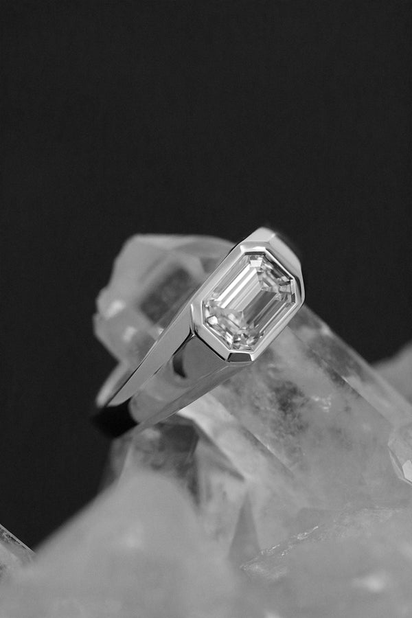 Emerald Cut Diamond East West Bezel Set Ring White Gold