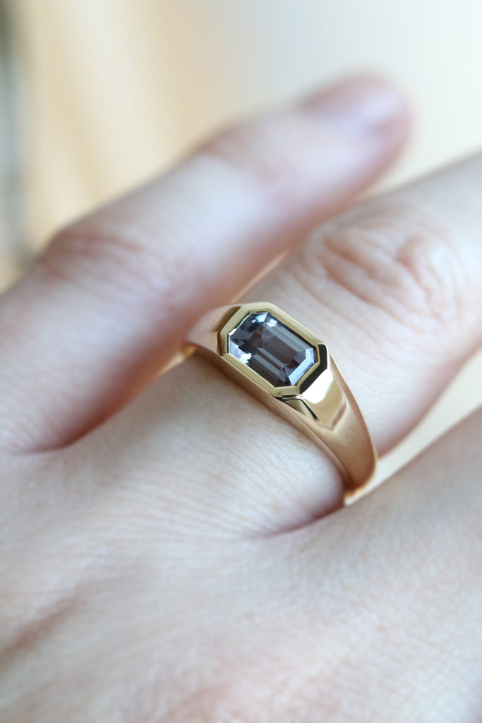 Emerald Cut Lilac Spinel East West Bezel Set Ring Yellow Gold