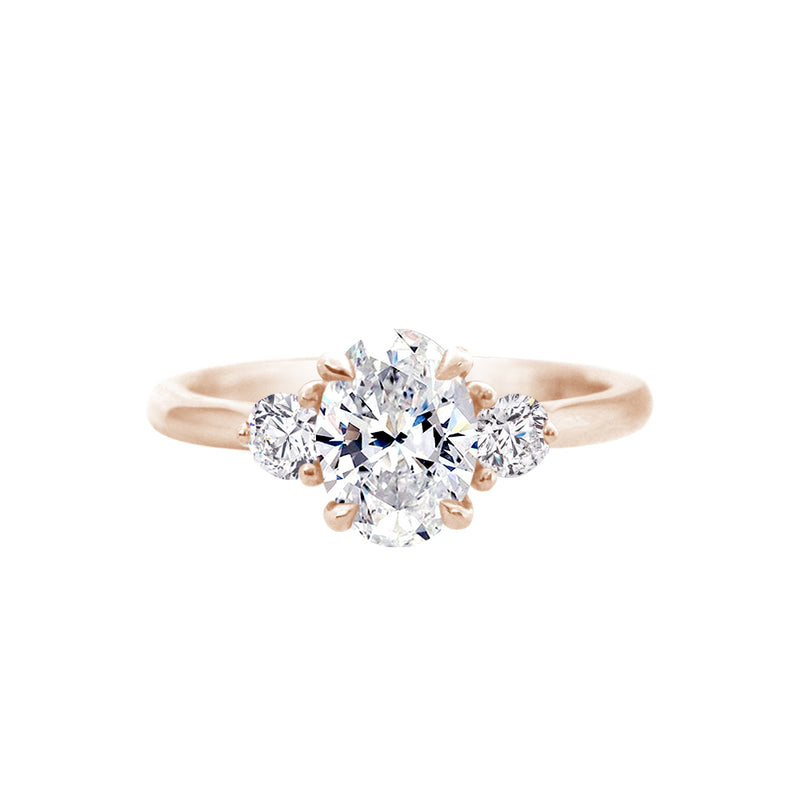 Oval Diamond Trilogy Engagement Ring With Side Diamonds Rose Gold