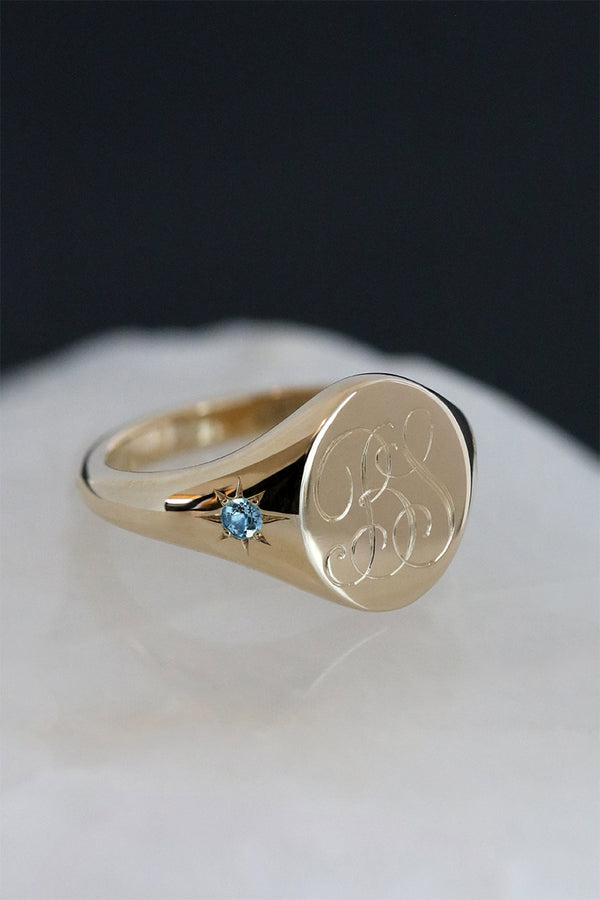 Star Set Blue Topaz Monogram Oval Signet Ring Yellow Gold