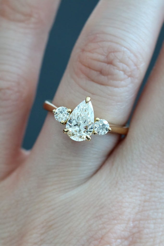 Pear Diamond Trilogy Engagement Ring With Side Diamonds Yellow Gold