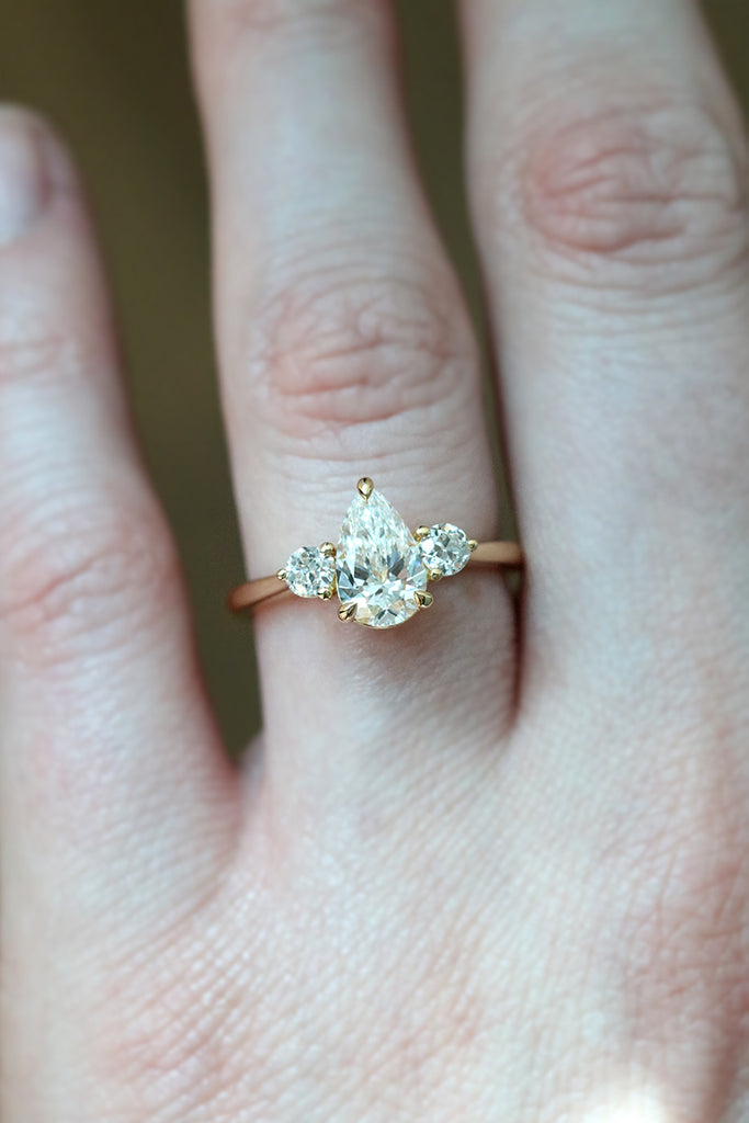 Pear Diamond Trilogy Engagement Ring With Side Diamonds Yellow Gold