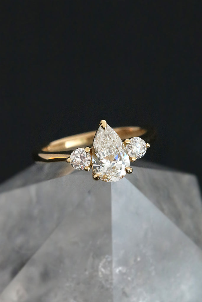 Pear Diamond Trilogy Engagement Ring With Side Diamonds Yellow Gold