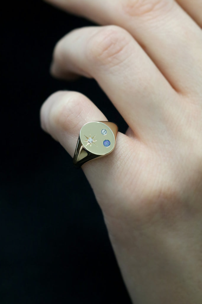 Oval Signet Ring with Blue Sapphires and Star Set Diamond Yellow Gold