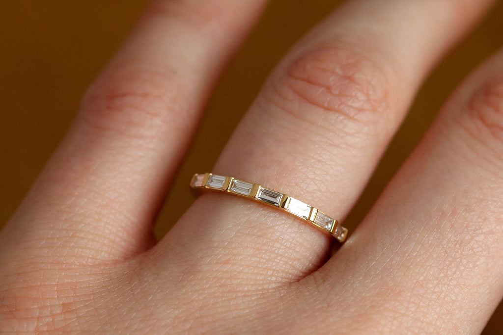 baguette diamond ring on hand