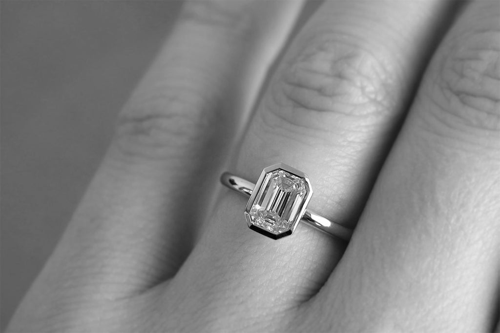 Bezel Set Emerald Cut Diamond Engagement Ring White Gold