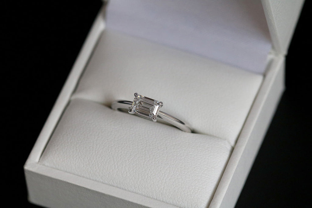 East-West Emerald Cut Diamond Engagement Ring Platinum