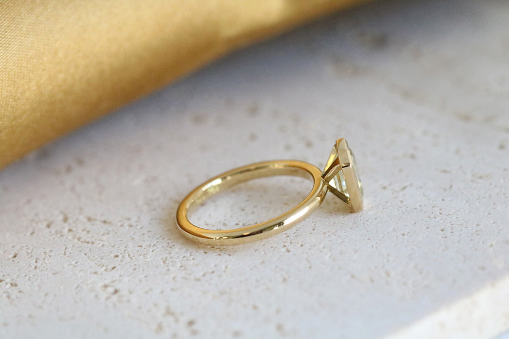 Bezel Set Emerald Cut Diamond Engagement Ring Yellow Gold