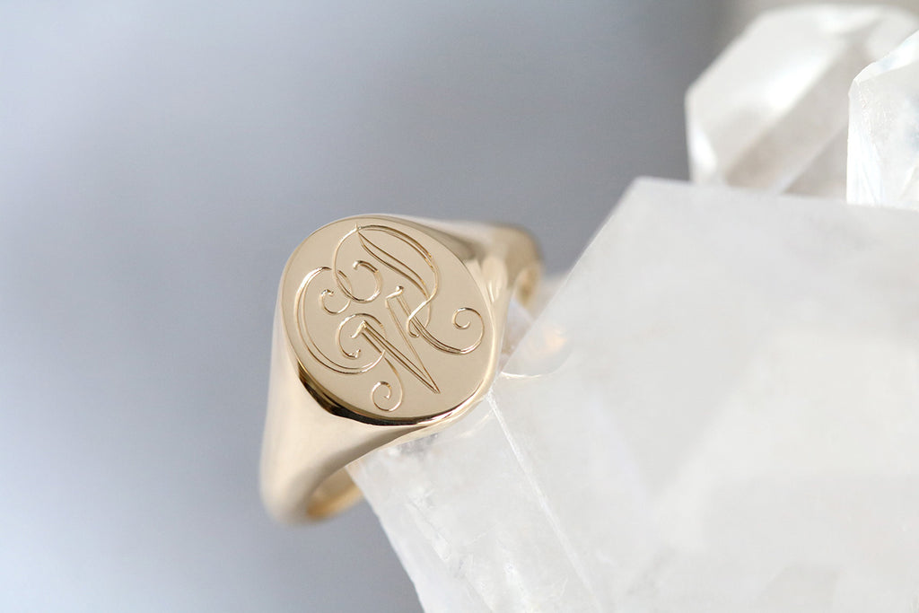yellow gold engraved signet ring