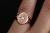 rose gold signet ring with star set diamond