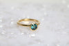 teal sapphire ring in yellow gold