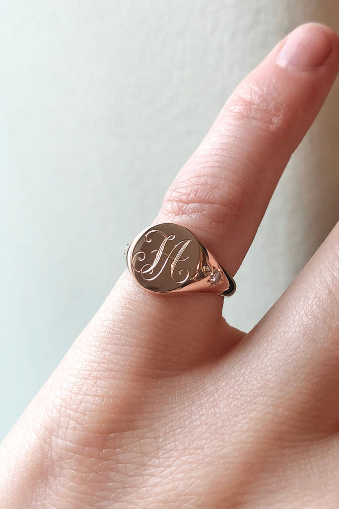 rose gold engraved monogram signet ring with diamonds