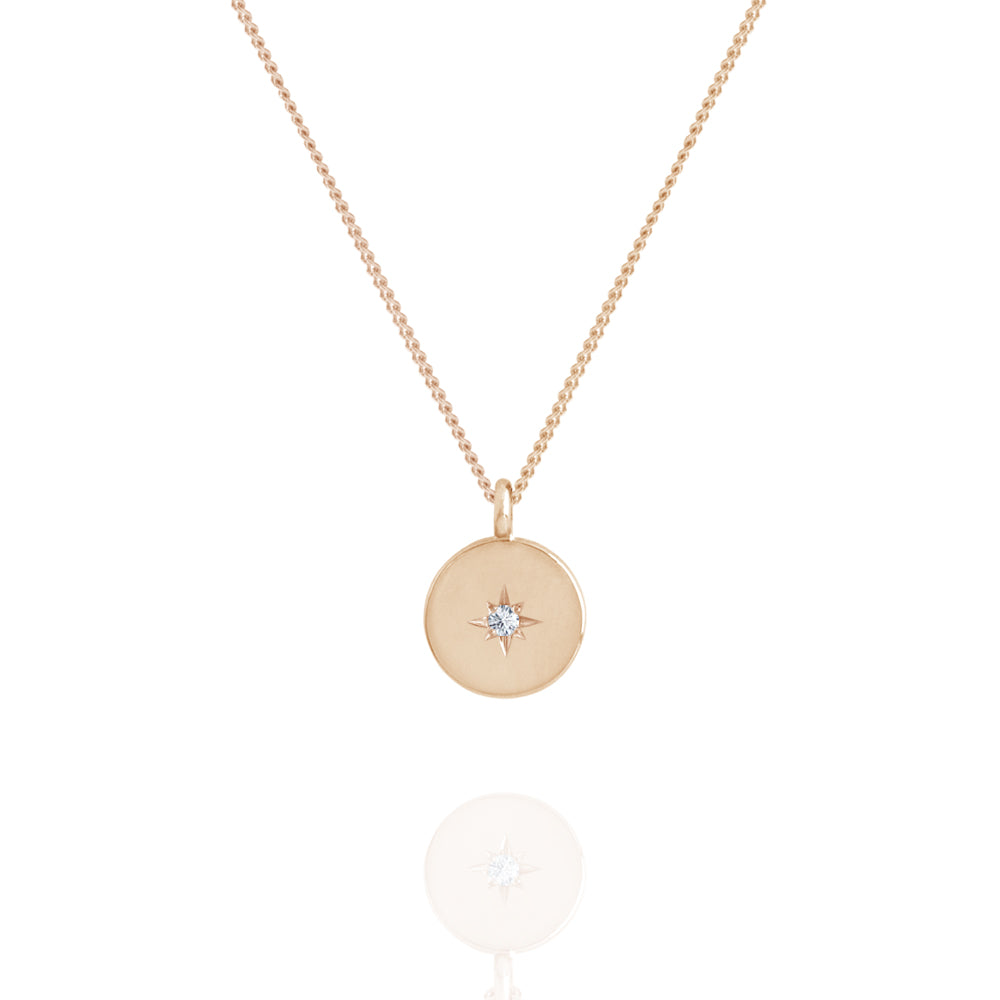 Star set diamond disc pendant rose gold