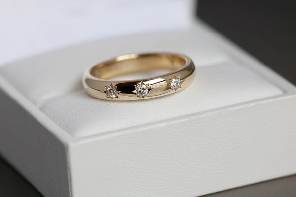 yellow gold ring with star set diamonds