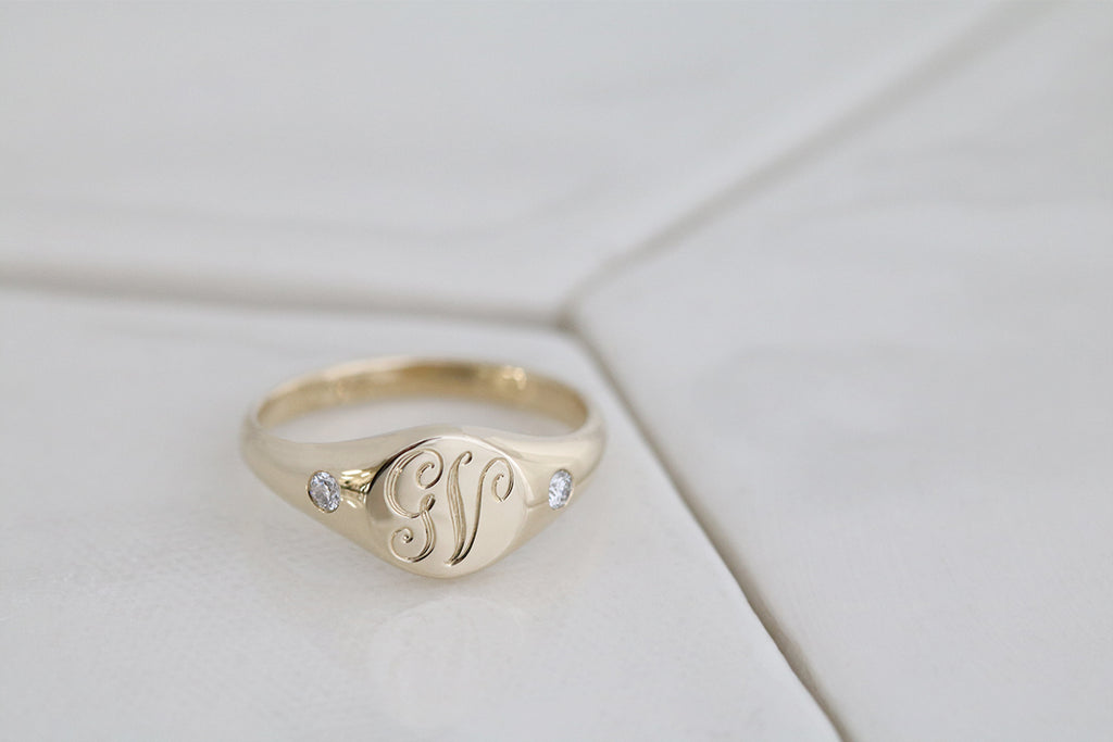 engraved initials signet ring with side diamonds
